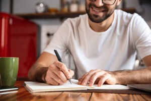 Man writing with pen