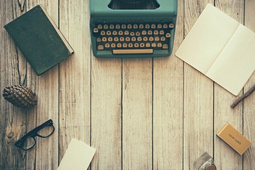 Typewriter, desk, book